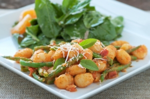 Delicious homemade gnocchi with fresh garden greens