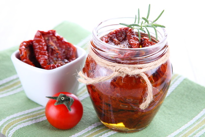 Sun dried tomatoes with olive oil in a jar